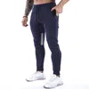 Men's Sports Fitness Long Pants with Pockets Casual Drawstring Trousers Slim Fit Outdoor Streetwear Breathable Eco-Friendly