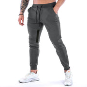 Men's Sports Fitness Long Pants with Pockets Casual Drawstring Trousers Slim Fit Outdoor Streetwear Breathable Eco-Friendly