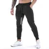 Men's Sports Fitness Long Pants with Pockets Casual Drawstring Trousers Slim Fit Outdoor Streetwear Breathable Eco-Friendly