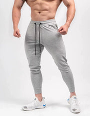 Spring and Autumn Cotton Sports Pants Slim Fit Men Jogger Pants Fitness Pants Muscle Boy Pure Color Stretch Running Pants
