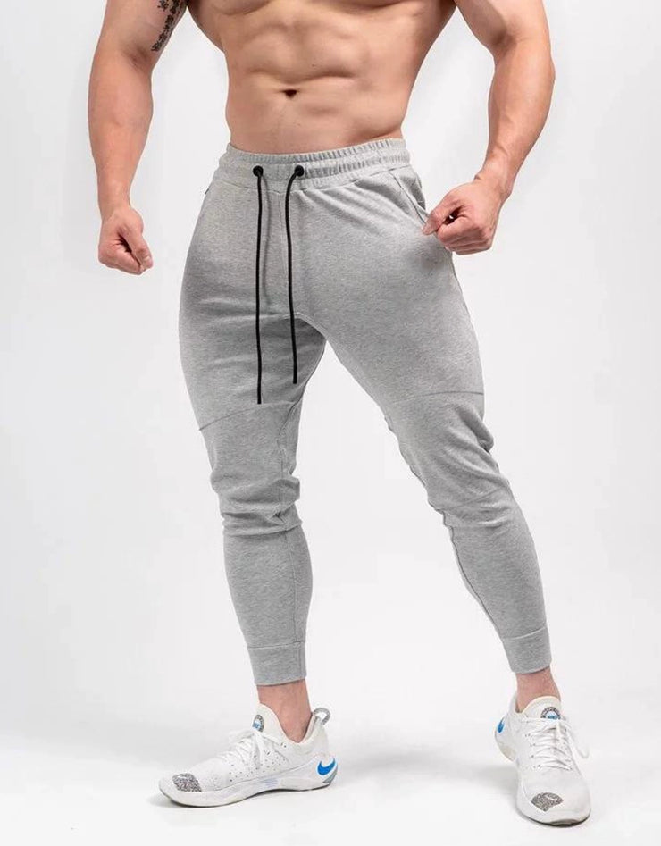 Spring and Autumn Cotton Sports Pants Slim Fit Men Jogger Pants Fitness Pants Muscle Boy Pure Color Stretch Running Pants
