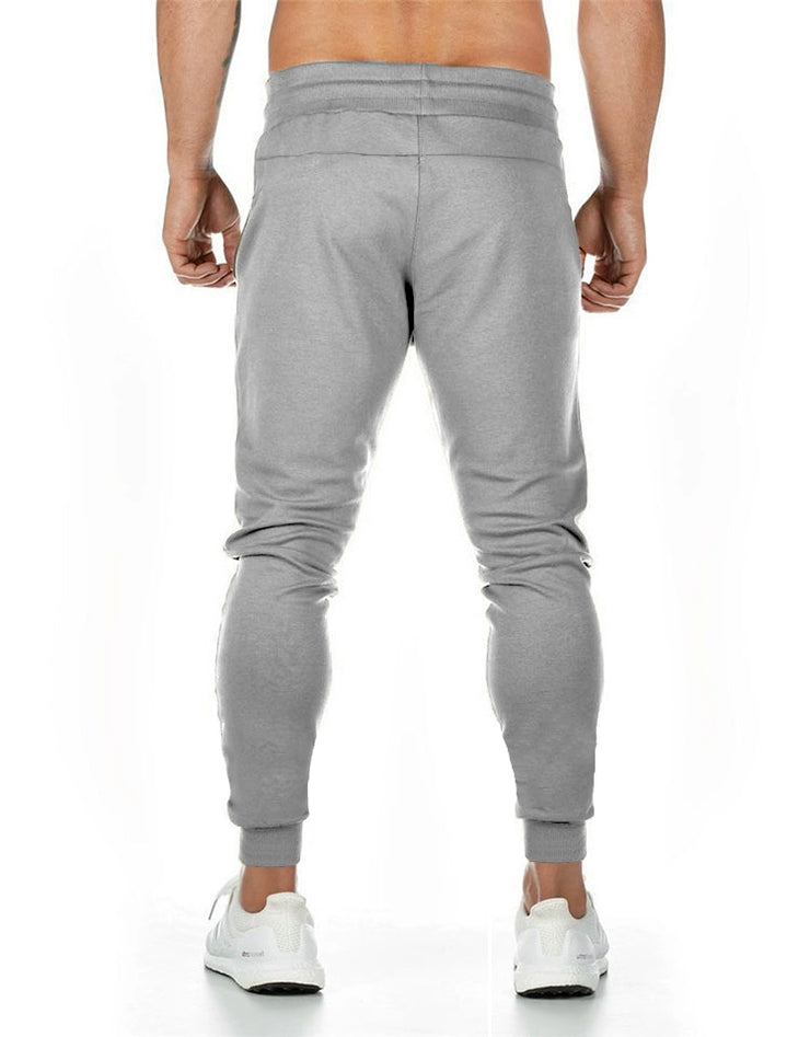 Spring and Autumn Cotton Sports Pants Slim Fit Men Jogger Pants Fitness Pants Muscle Boy Pure Color Stretch Running Pants