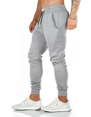 Spring and Autumn Cotton Sports Pants Slim Fit Men Jogger Pants Fitness Pants Muscle Boy Pure Color Stretch Running Pants