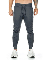 Spring and Autumn Cotton Sports Pants Slim Fit Men Jogger Pants Fitness Pants Muscle Boy Pure Color Stretch Running Pants