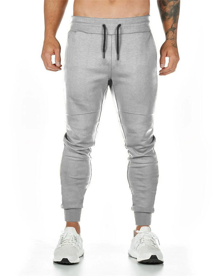 Spring and Autumn Cotton Sports Pants Slim Fit Men Jogger Pants Fitness Pants Muscle Boy Pure Color Stretch Running Pants