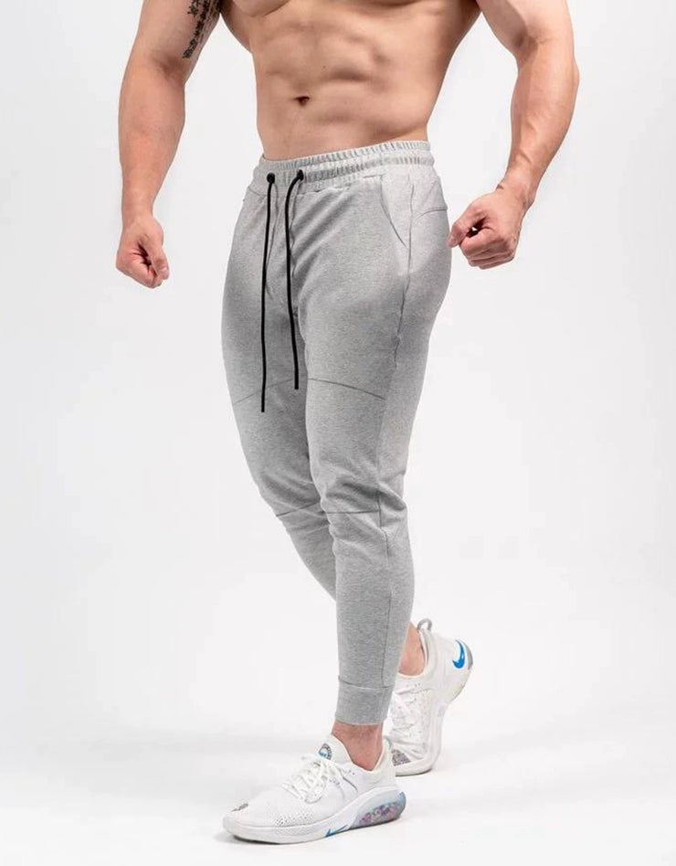 Spring and Autumn Cotton Sports Pants Slim Fit Men Jogger Pants Fitness Pants Muscle Boy Pure Color Stretch Running Pants