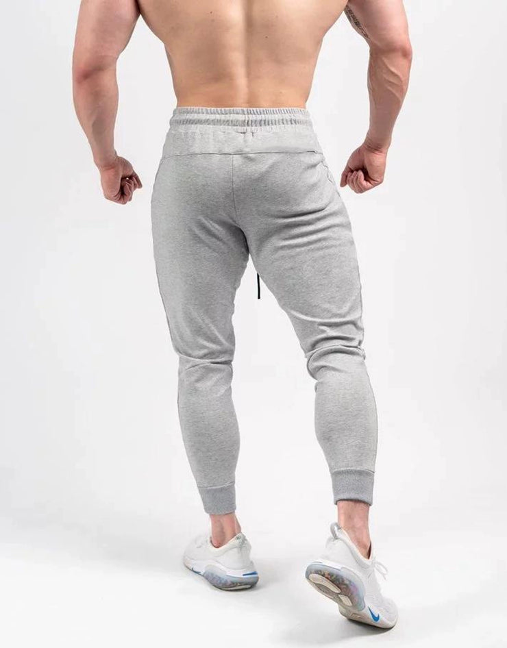 Spring and Autumn Cotton Sports Pants Slim Fit Men Jogger Pants Fitness Pants Muscle Boy Pure Color Stretch Running Pants