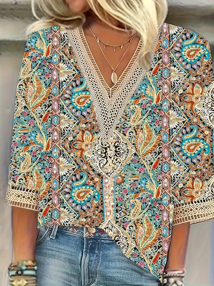 Elegant loose woman shirt with colorful print, casual long sleeve blouse for holidays and weekends.