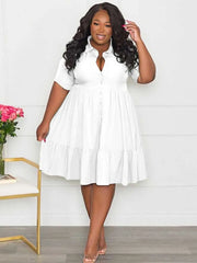 Elegant plus size women’s shirt style dress with short sleeves, buttons, and A-line silhouette, in solid color for summer.