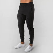 Men's Muscle Fitness Running Pants Outdoor Exercise Training Small Foot Workout Wolf King Design Casual Skinny Cotton Trousers