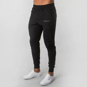 Men's Muscle Fitness Running Pants Outdoor Exercise Training Small Foot Workout Wolf King Design Casual Skinny Cotton Trousers