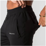 Men's Muscle Fitness Running Pants Outdoor Exercise Training Small Foot Workout Wolf King Design Casual Skinny Cotton Trousers