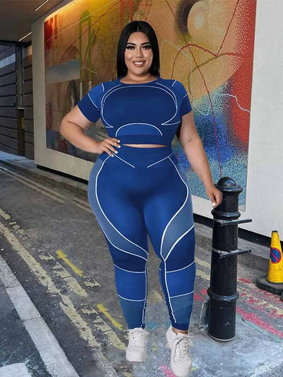Plus size women tracksuit 2 piece set with short sleeves in casual slimming design.