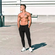 Men's Muscle Fitness Casual Sports Pants Breathable Lightweight Running Trousers Eye-Catching Outdoor Small Footwear Trend Summer