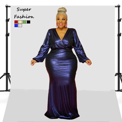 Plus size floor-length V-neck dress in blue with puff sleeves for formal occasions.