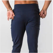 Men's Muscle Fitness Running Pants Outdoor Exercise Training Small Foot Workout Wolf King Design Casual Skinny Cotton Trousers