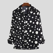 Men's cotton-linen two-piece set with black and white polka dot design, featuring a button-up long sleeve shirt and elastic waist shorts.