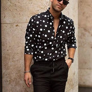 Men's cotton-linen two-piece set with black polka dot button shirt and elastic waist shorts, perfect for casual beachwear.