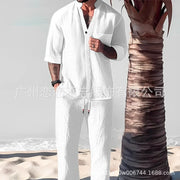 Men's summer casual cotton linen two-piece set with V-neck and half sleeves, ideal for comfort and style on the beach.