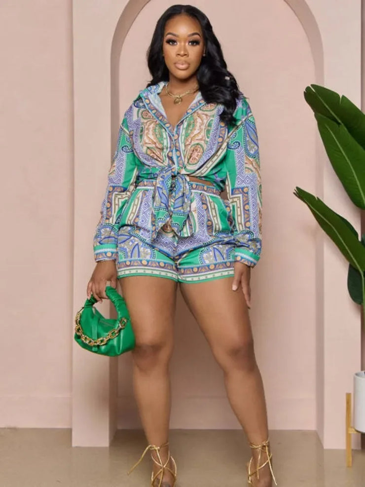 Casual 2 pieces set with flower print shirt and elastic waist shorts for women.