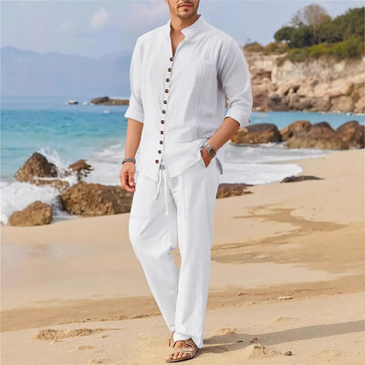 Men's Cuban style fashion shirt with multi-button stand collar on beach.