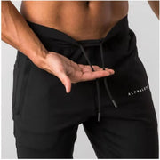 Men's Muscle Fitness Running Pants Outdoor Exercise Training Small Foot Workout Wolf King Design Casual Skinny Cotton Trousers
